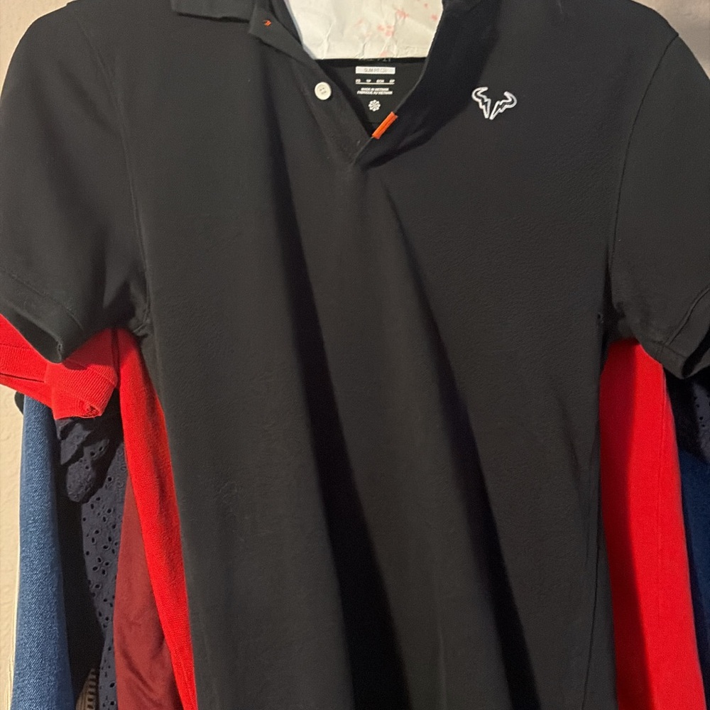 Nike Black Polo with White Logo and Red Accent